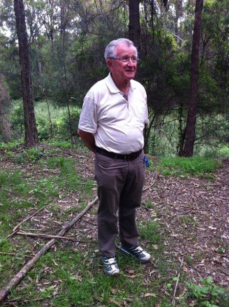 Uncle Neil Sainsbury on river bank above Duck Creek swimming hole, Auburn